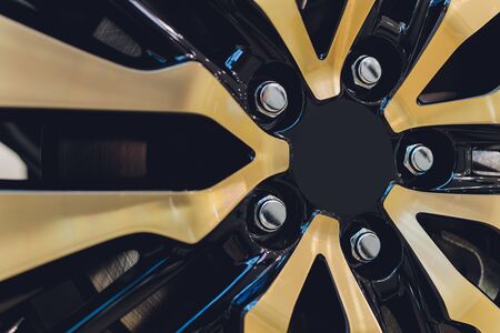 Second hand alloy wheels in store, selective focus.