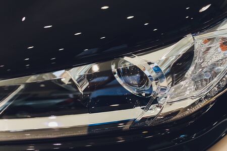 Detail of a beauty and fast car with headlight.