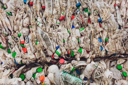 Plastic bales of juice packages at waste processing plant. Concept of separate garbage collection...