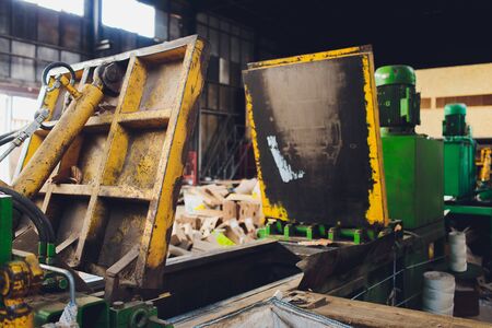 Special equipment for pressing paper waste at a waste sorting plant for further disposal or...