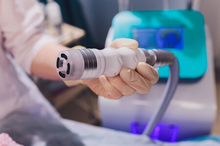 Modern technology medical health and beauty treatment with electrostimulation EMS slimming machine.の写真素材