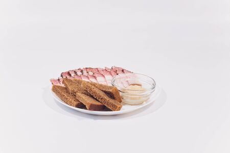 Sliced pork lard. Sliced bacon. Fat, tallow, grease, bacon. isolate whiteの写真素材