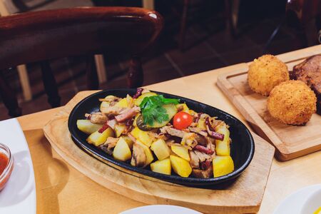 Dining table with a variety of snacks and salads. Salmon, olives, wine, vegetables, grilled fish toast. The concept of a family celebratory dinner. Thanksgiving, Christmas. top veiwの写真素材