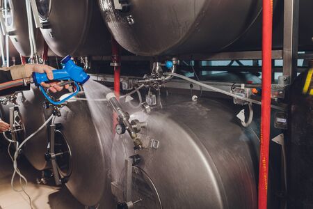 Brewery metal capacity equipment in factory workshop.の写真素材
