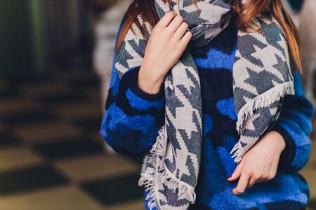 portrait of the woman with scarf on black background