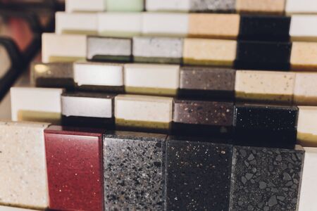 home furnishing store demonstrating variants of stone for kitchen countertop