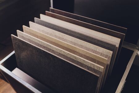 home furnishing store demonstrating variants of stone for kitchen countertop.の写真素材