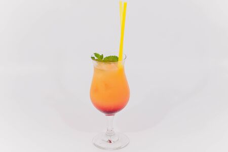 glass of aperol spritz cocktail isolated on white background.の写真素材