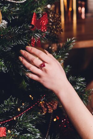 elegant young woman with jewelry at restaurant.の写真素材