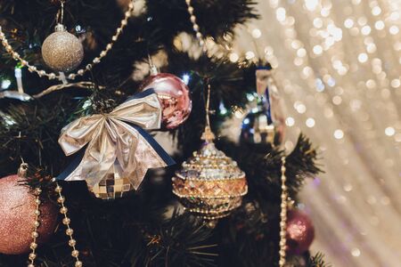 Christmas tree with white and black gifts in the bedroom Christmas. Beautifully decorated house with a silver, white and black tree and presents at Christmas. Magic timeの写真素材