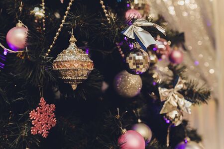 Christmas tree with white and black gifts in the bedroom Christmas. Beautifully decorated house with...