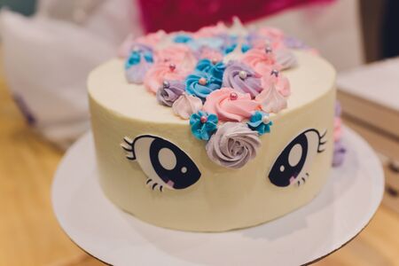 Cake birthday girl with figure, figure rainbow and unicorn