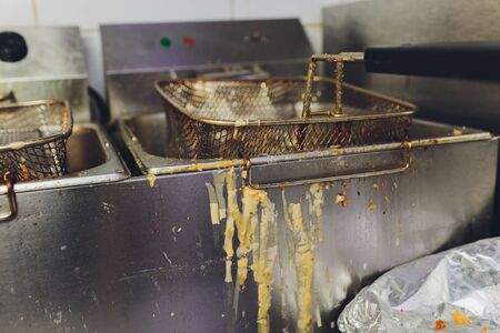 Deep fryer with oil on restaurant kitchen.の写真素材