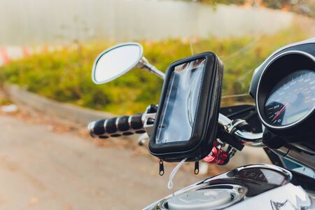 Power outlet for charger mobilephone on a modern motorcycle,Close up and selective focus.の写真素材