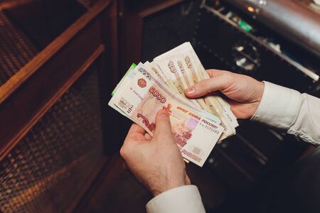 Russian rubles in the hands of a business woman