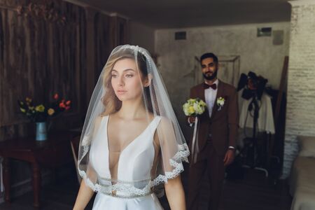 The bride and groom on their wedding day. Engagement of newlyweds. Girl in wedding dress.