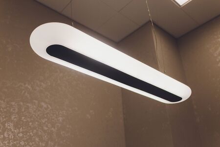 Design loft lamp with dim light and straight long line of beamDesign loft lamp with dim light and...