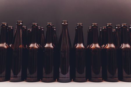 Close-up of beer bottles, focus on middle oneの写真素材