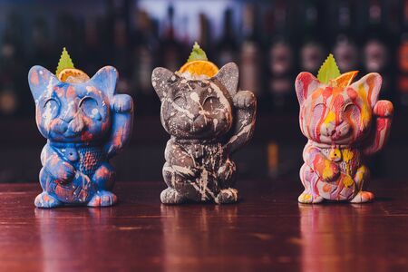 cat cocktails drinking vessel on the background of a wooden barの写真素材
