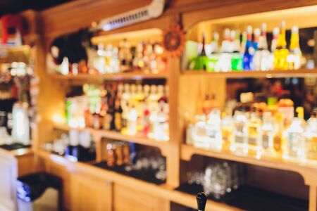 Blurred background with restaurant blur interior alcohol alcohol bottlesの写真素材