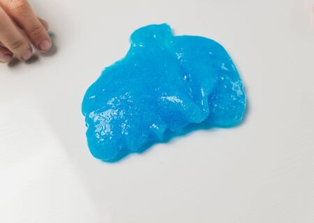 Kid Playing Hand Made Toy Called Slime Alien drool Shell mussel.