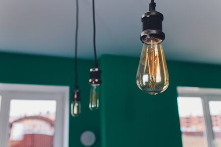 Vintage pendant Bulb Lighting interior decor off during the day.の写真素材