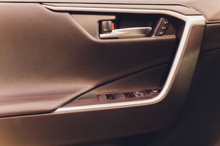 Close up image of a car door opener
