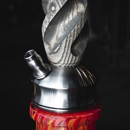 part of the hookah, modern design, on a black background.