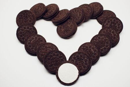 chocolate cookie isolated on white background close-up.