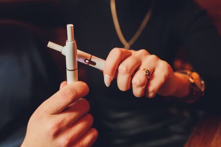 Modern hybrid cigarette device without burning tobacco, alternative smokingの写真素材