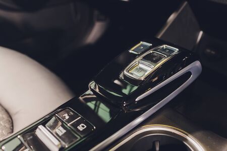 Modern automatic gearbox shifter in new carの写真素材