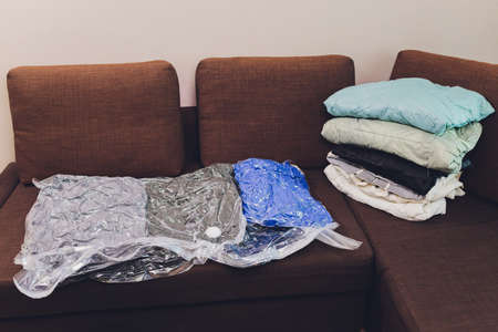 Space saver saving seal bag sucking air out , vacuum clothing storage compressed package.の写真素材