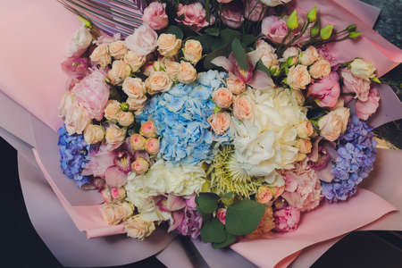 A flower bouquet with a lot of different flowers.の写真素材