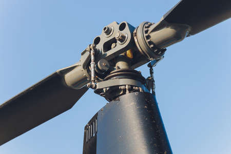 Detail of Helicopter Engineering on a beautiful blue sky,Military Helicopter fighter cockpit.の写真素材
