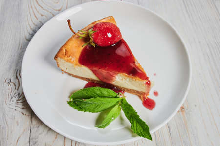 Cold cheesecake with strawberry and strawberry jelly.の写真素材