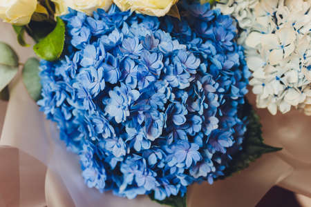 A flower bouquet with a lot of different flowers.の写真素材