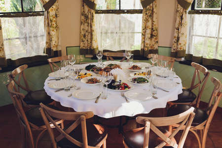 Beautifully organized event - served banquet tables ready for guests.