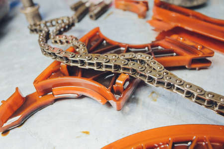 The iron gearbox of a car s transmission disassembly of the transmission chain and parts, repair.の写真素材