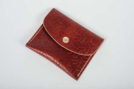 genuine leather wallet brown color on isolated white background.