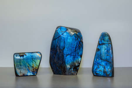 Amazing colorful Quartz Rainbow Flame Blue Aqua Aura crystal cluster closeup macro isolated on white background.の写真素材