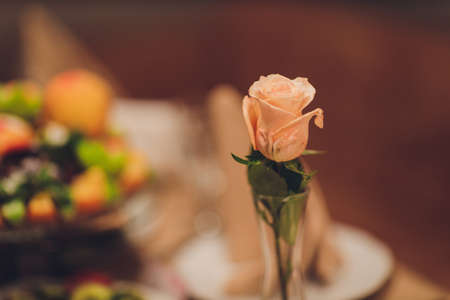 Table setting at a luxury wedding reception. Beautiful flowers on the table.の写真素材