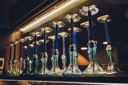 group of eastern hookahs on table close-up.