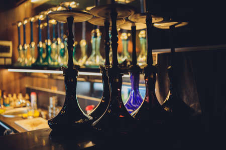 group of eastern hookahs on table close-up.の写真素材
