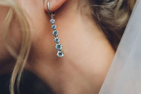close up of boho styled woman hands with silver jewelry.の写真素材
