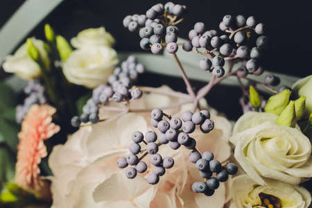 A flower bouquet with a lot of a different flowers.の写真素材