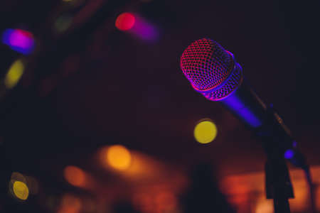 Close up of microphone in concert hall or conference room.の写真素材