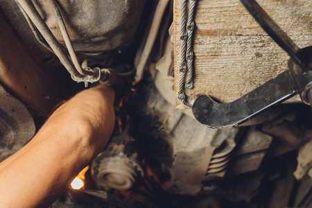 The iron gearbox of a car s transmission disassembly of the transmission chain and parts, repair.の写真素材