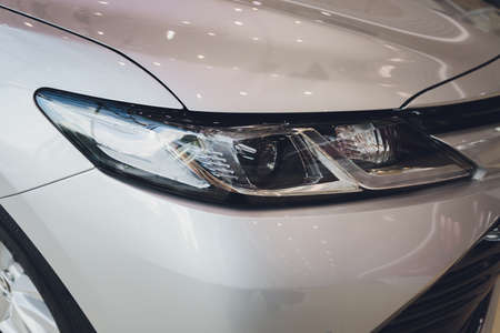 Detail of a beauty and fast car with headlight.