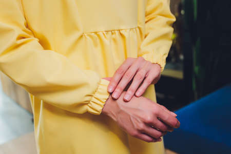 Muslim woman in hijab praying on mat indoors.の写真素材