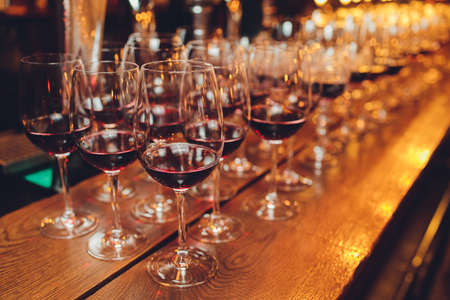 Red wine in glasses. Shallow depth of field.の写真素材